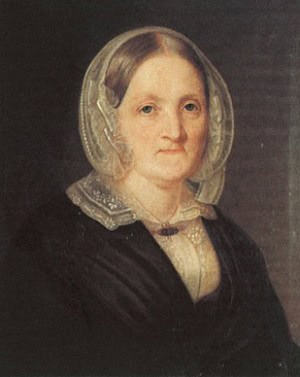 Porträtt av Gustafva Björklund. Hämtad från Wikipedia. Tavlan finns hos Lilla sällskapet. 